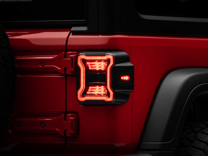 Raxiom 18-22 Jeep Wrangler JL LED Tail Lights- Black Housing (Smoked Lens) - Bull Strap