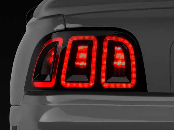 Raxiom 96-98 Ford Mustang Icon LED Tail Lights- Black Housing (Smoked Lens) - Bull Strap