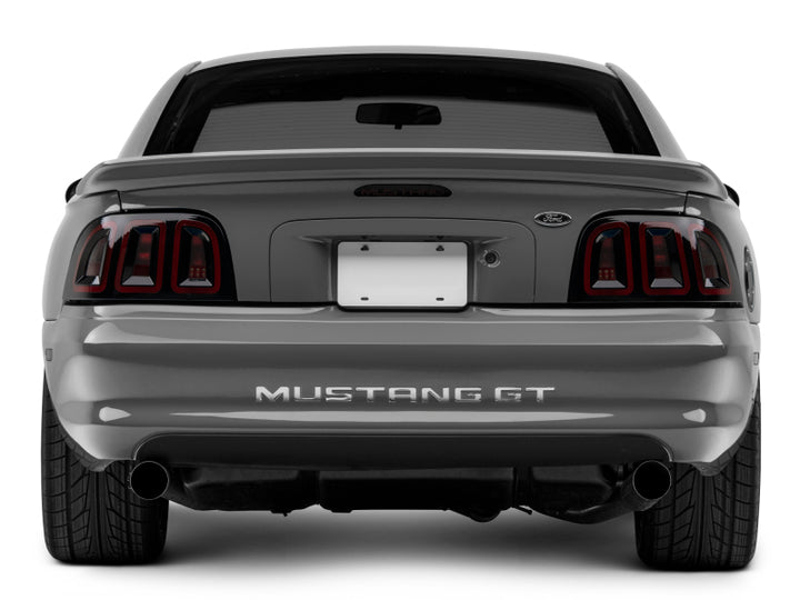 Raxiom 96-98 Ford Mustang Icon LED Tail Lights- Black Housing (Smoked Lens) - Bull Strap