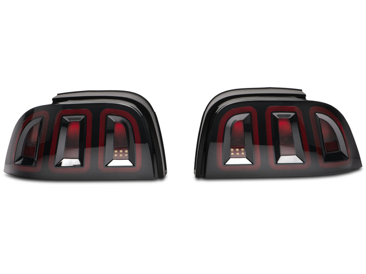 Raxiom 96-98 Ford Mustang Icon LED Tail Lights- Black Housing (Smoked Lens) - Bull Strap