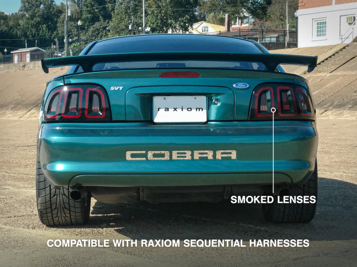 Raxiom 96-98 Ford Mustang Icon LED Tail Lights- Black Housing (Smoked Lens) - Bull Strap