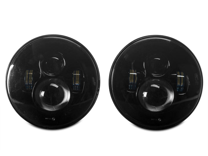 Raxiom 97-18 Jeep Wrangler TJ/JK Axial Series LED Daymaker Headlights- Black Housing (Clear Lens) - Bull Strap