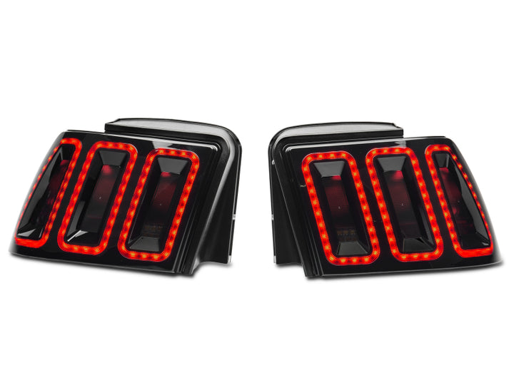 Raxiom 99-04 Ford Mustang Excluding 99-01 Cobra Icon LED Tail Lights- Black Housing (Smoked Lens) - Bull Strap