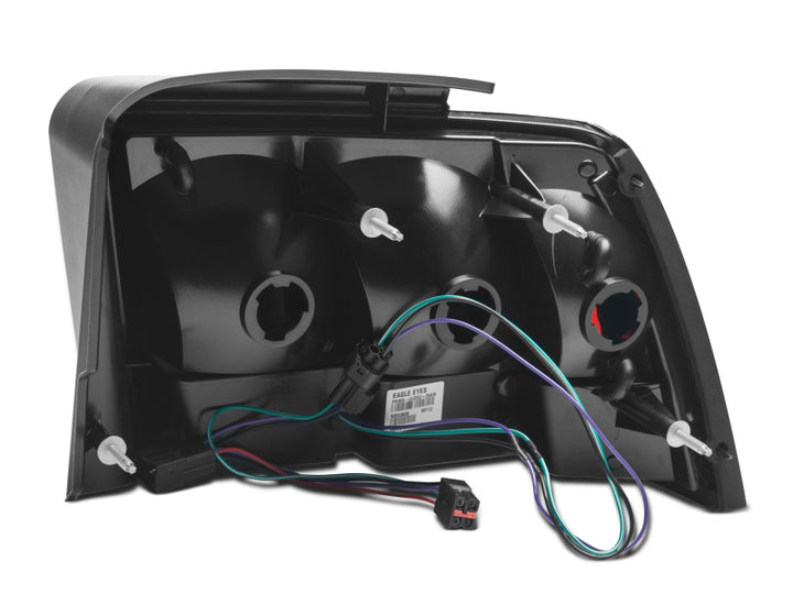 Raxiom 99-04 Ford Mustang Excluding 99-01 Cobra Icon LED Tail Lights- Black Housing (Smoked Lens) - Bull Strap