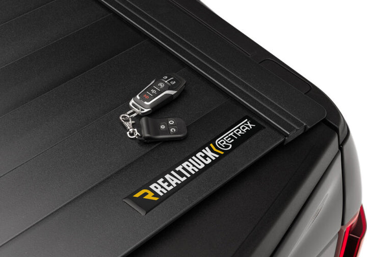 Retrax 19-22 GM Silverado / Sierra 1500 5ft. 8in. Bed PowertraxPRO MX - Bull Strap