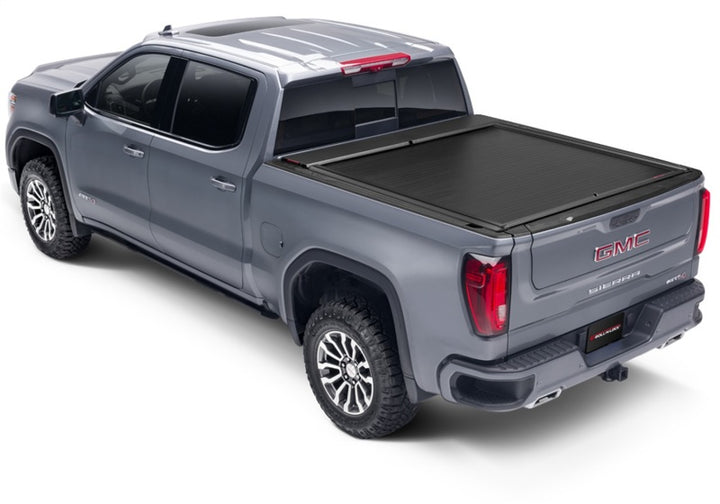 Roll-N-Lock 09-18 RAM 1500 / 10-22 RAM 2500-3500 (76.3in. Bed Length) A-Series XT Retractable Cover - Bull Strap