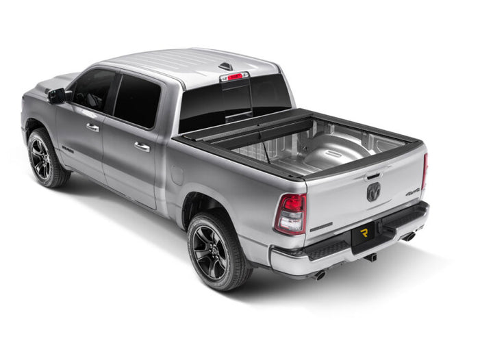Roll-N-Lock 19-23 RAM 1500 w/o Swing Gate Tailgate SB 76.3in M-Series Retractable Tonneau Cover - Bull Strap