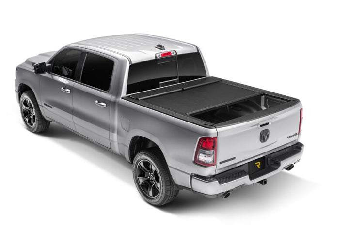 Roll-N-Lock 19-23 RAM 1500 w/o Swing Gate Tailgate SB 76.3in M-Series Retractable Tonneau Cover - Bull Strap