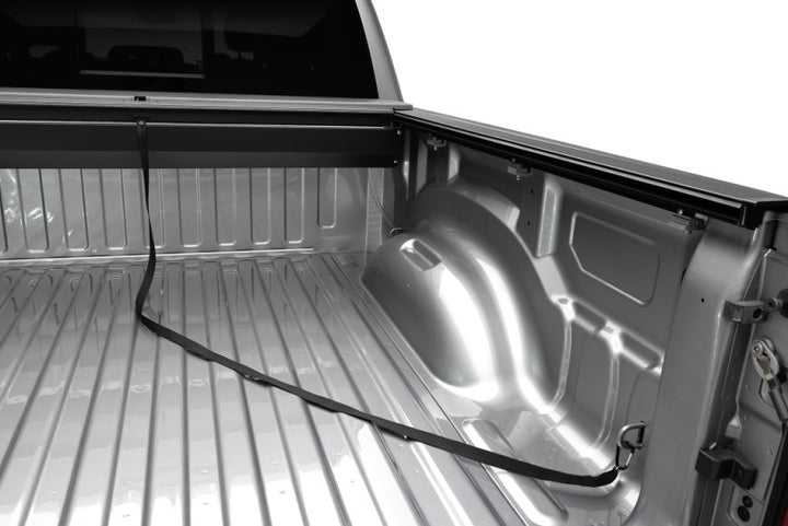 Roll-N-Lock 19-23 RAM 1500 w/o Swing Gate Tailgate SB 76.3in M-Series Retractable Tonneau Cover - Bull Strap