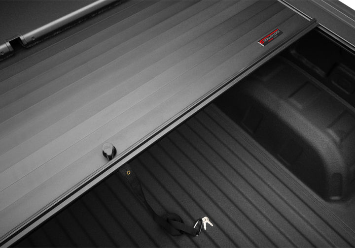 Roll-N-Lock 2019 Chevrolet Silverado 1500 XSB 68-3/8in A-Series Retractable Tonneau Cover - Bull Strap