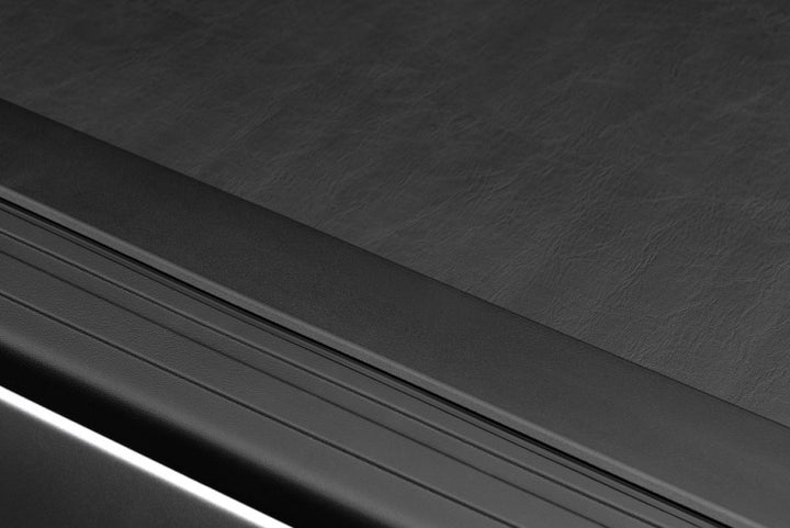 Roll-N-Lock 2019 RAM 1500 65-1/2in M-Series Retractable Tonneau Cover - Bull Strap