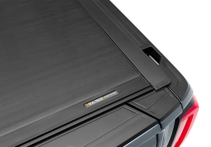 Roll-N-Lock 2020 Chevy Silverado / GMC Sierra 2500-3500 80-1/2in M-Series Retractable Tonneau Cover - Bull Strap