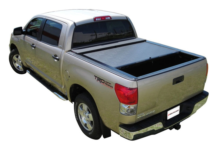 Roll-N-Lock 2022 Toyota Tundra Crew Cab/Double Cab 66.7in M-Series Retractable Tonneau Cover - Bull Strap
