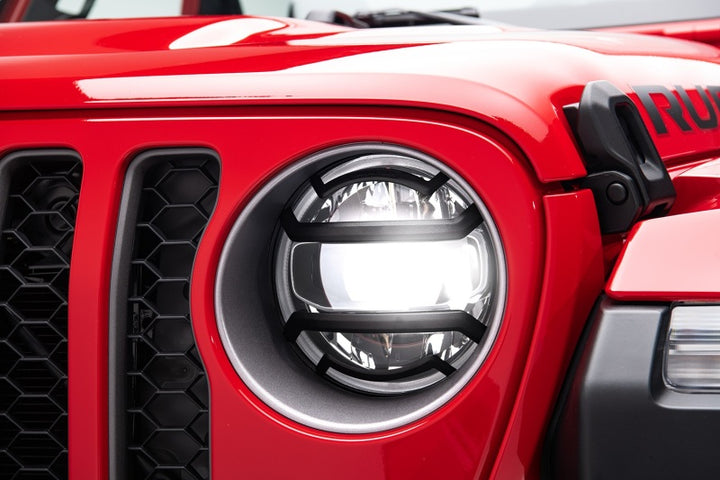 Rugged Ridge 18-20 Jeep Wrangler JL / 2020 Jeep Gladiator JT Black Elite Headlight Guards Black - Bull Strap