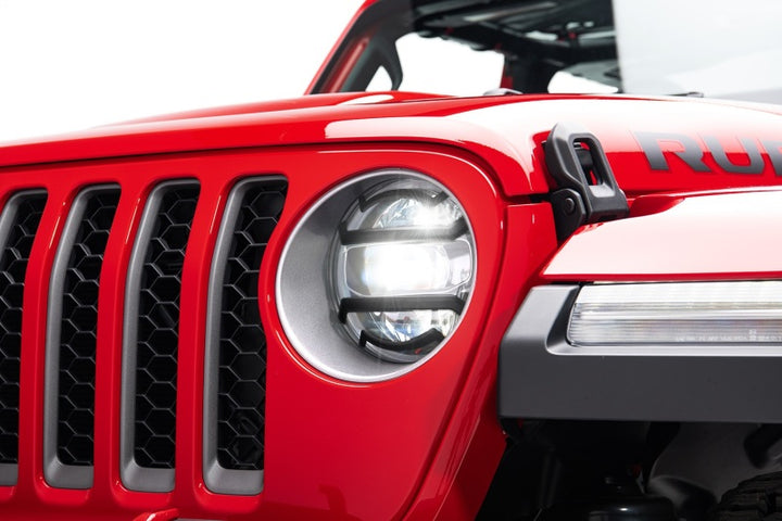 Rugged Ridge 18-20 Jeep Wrangler JL / 2020 Jeep Gladiator JT Black Elite Headlight Guards Black - Bull Strap
