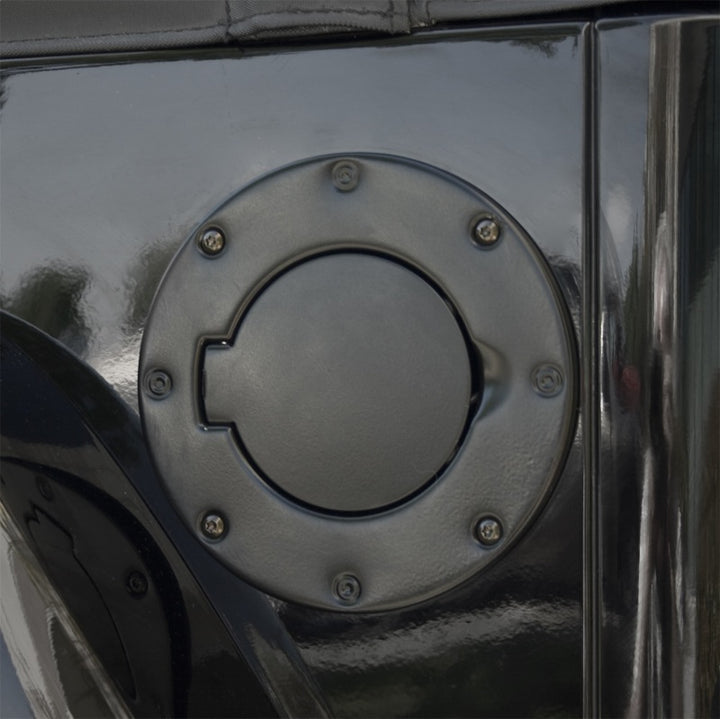 Rugged Ridge 97-06 Jeep Wrangler TJ Black Non-Locking Gas Cap Door - Bull Strap