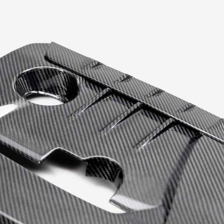 Seibon 23-24 Toyota GR Corolla Carbon Fiber Engine Cover - Matte Finish - Bull Strap