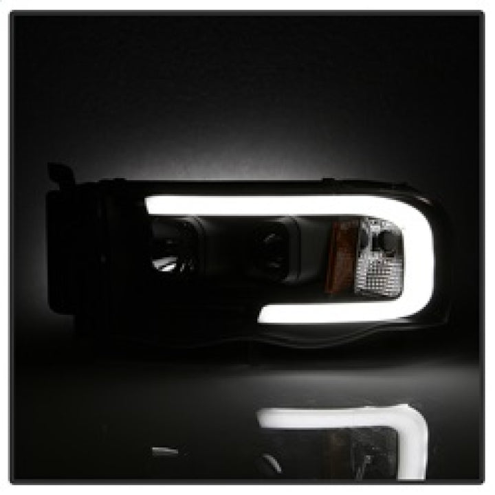 Spyder 02-05 Dodge Ram 1500 Light Bar Projector Headlights - Black (PRO-YD-DR02V2-LB-BK) - Bull Strap