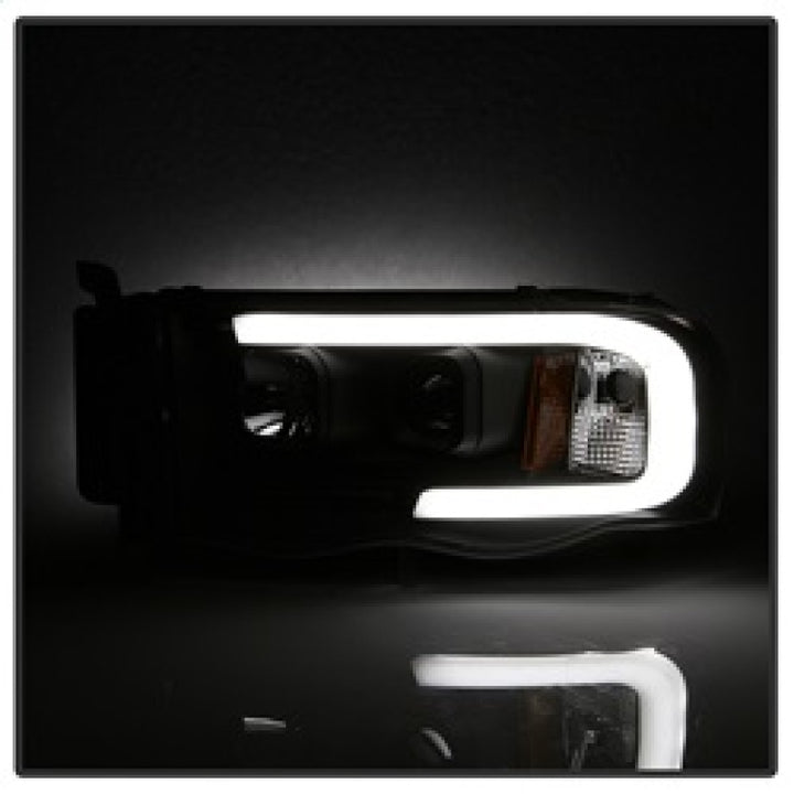 Spyder 02-05 Dodge Ram 1500 Light Bar Projector Headlights - Black (PRO-YD-DR02V2-LB-BK) - Bull Strap