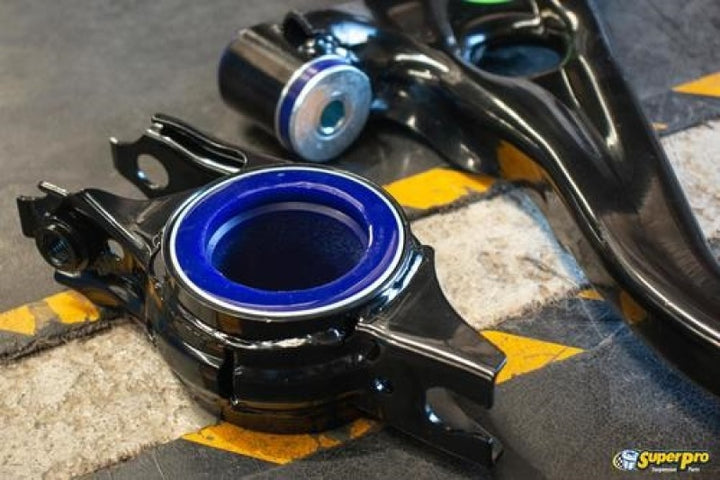 SuperPro 2016 Honda Civic EX Front Lower Control Arm Set w/ Bushings - Bull Strap