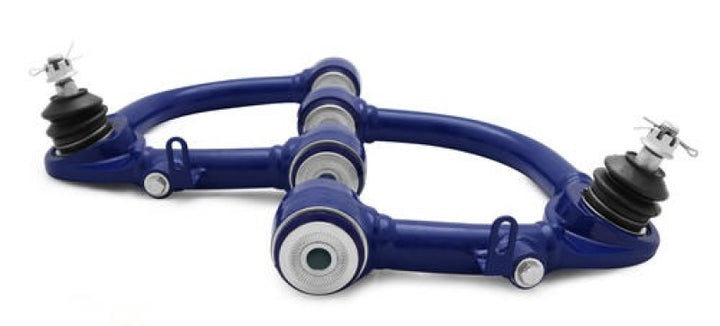 SuperPro Toyota Land Cruiser 100 Series Front Upper Fixed Offset Control Arm Set - Bull Strap