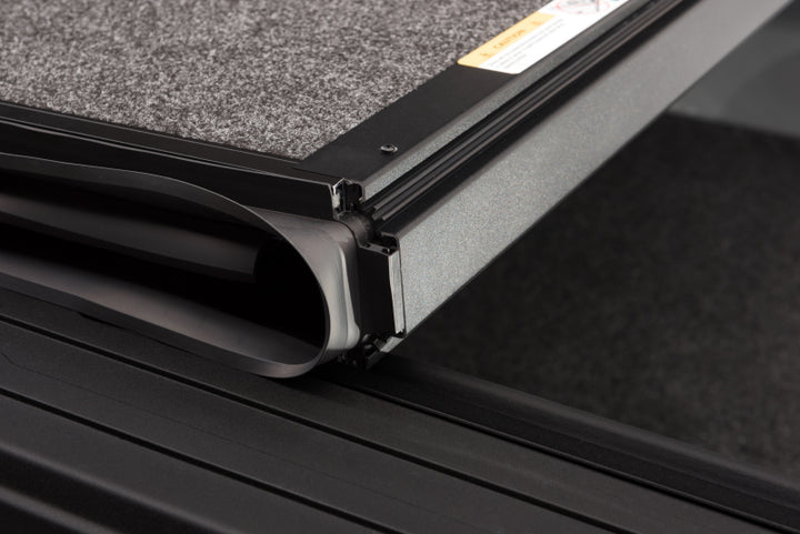 UnderCover 15-20 Ford F-150 5.5ft Ultra Flex Bed Cover - Matte Black Finish - Bull Strap