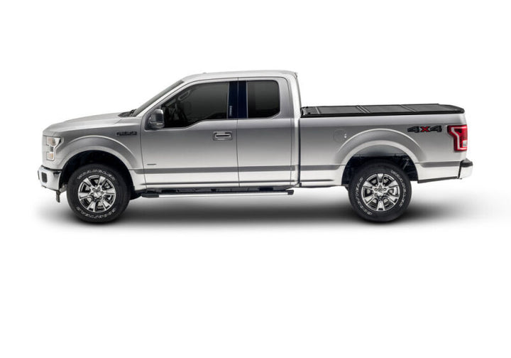 UnderCover 15-20 Ford F-150 5.5ft Ultra Flex Bed Cover - Matte Black Finish - Bull Strap