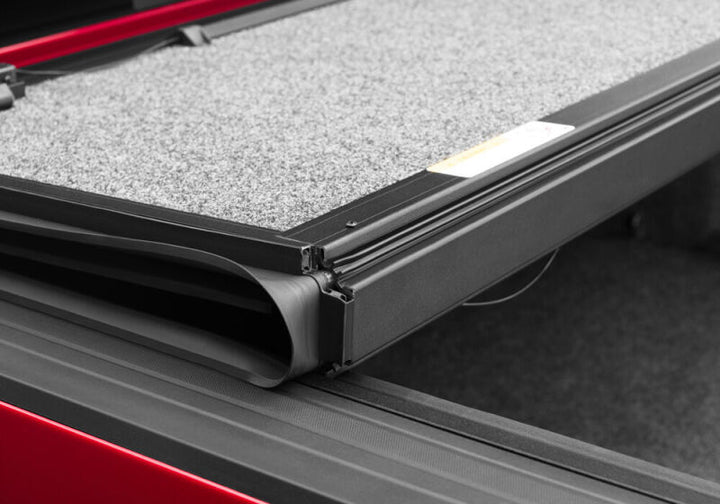 UnderCover 2022 Toyota Tundra C 4WD CrewMax 5.5ft Bed Ultra Flex Bed Cover - Matte Black Finish - Bull Strap