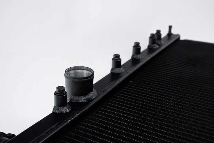CSF 02-07 Subaru WRX/STI Radiator - Black Finish - Bull Strap