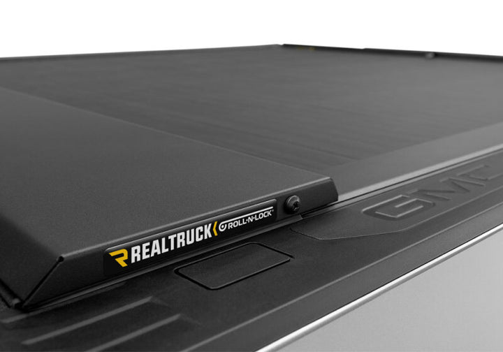 Roll-N-Lock 2020 Chevy Silverado / GMC Sierra 2500-3500 80-1/2in M-Series Retractable Tonneau Cover - Bull Strap
