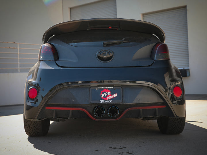 aFe Takeda 13-17 Hyundai Veloster L4-1.6L 2-1/2in 304 SS Axle-Back Exhaust w/ Blue Flame Tips - Bull Strap