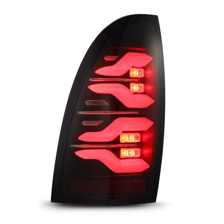 AlphaRex 05-15 Toyota Tacoma LUXX LED Taillights Blk w/Activ Light/Seq Signal - Bull Strap