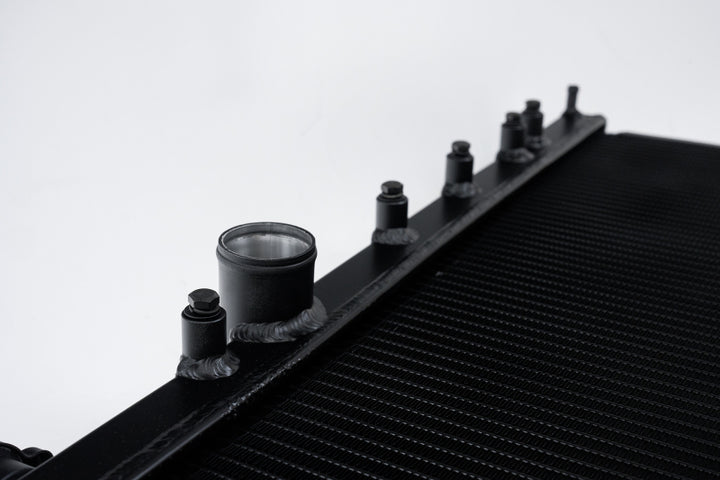 CSF 02-07 Subaru WRX/STI Radiator - Black Finish - Bull Strap