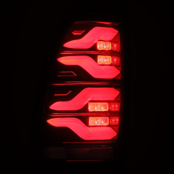 AlphaRex 05-15 Toyota Tacoma LUXX LED Taillights Blk/Red w/Activ Light/Seq Signal - Bull Strap