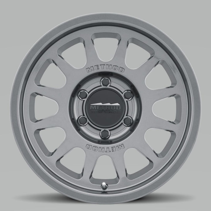 Method MR703 17x7.5 +50mm Offset 6x130 84.1mm CB Gloss Titanium Wheel - Bull Strap