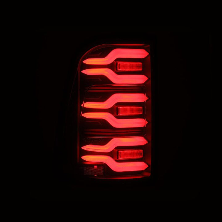 AlphaRex 19-21 Dodge Ram 1500 Luxx-Series LED Tail Lights Black w/Activ Light/Seq Signal - Bull Strap