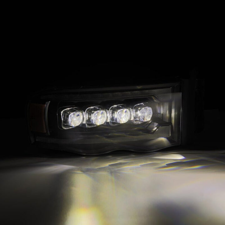 AlphaRex 02-05 Dodge Ram 1500 NOVA LED Proj Headlights Plank Style Blk w/Activ Light/Seq Signal - Bull Strap
