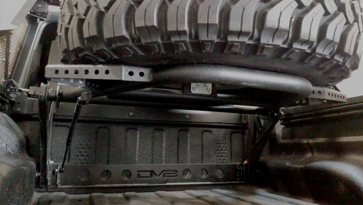 DV8 Offroad 2019+ Jeep Gladiator In-Bed Adjustable Tire Carrier - Bull Strap