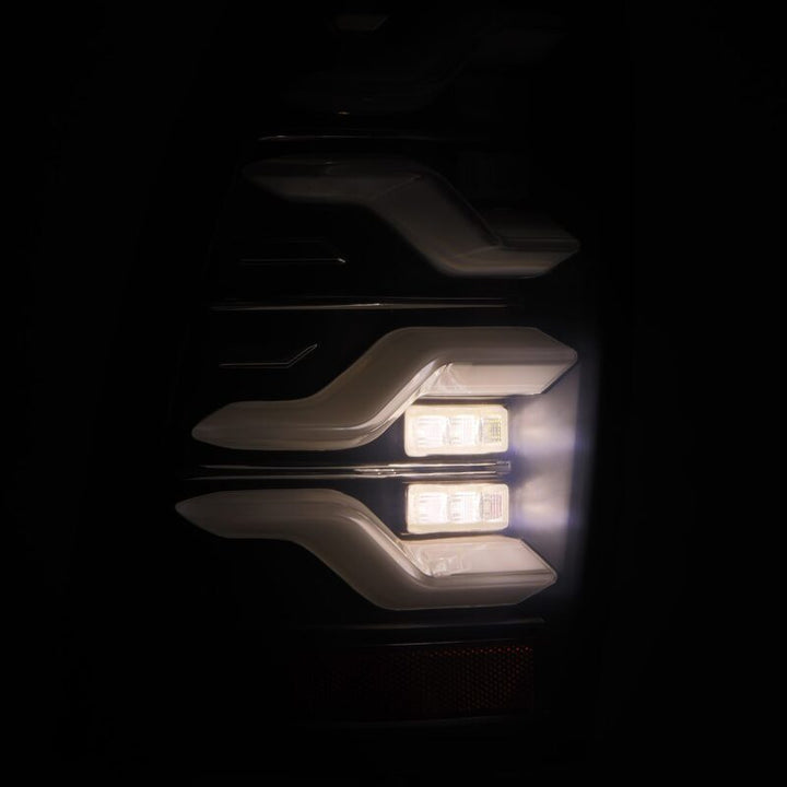 AlphaRex 05-15 Toyota Tacoma LUXX LED Taillights Blk w/Activ Light/Seq Signal - Bull Strap