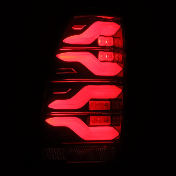 AlphaRex 05-15 Toyota Tacoma LUXX LED Taillights Blk/Red w/Activ Light/Seq Signal - Bull Strap