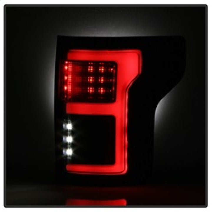 Spyder 15-17 Ford F-150 LED Tail Lights (w/Blind Spot) - Black Smoke (ALT-YD-FF15015BS-LBLED-BSM) - Bull Strap