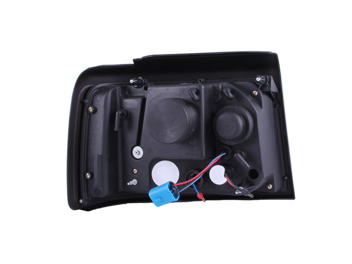 ANZO 1992-1996 Ford F-150 Projector Headlights w/ Halo Black w/ Side Markers and Parking Lights - Bull Strap