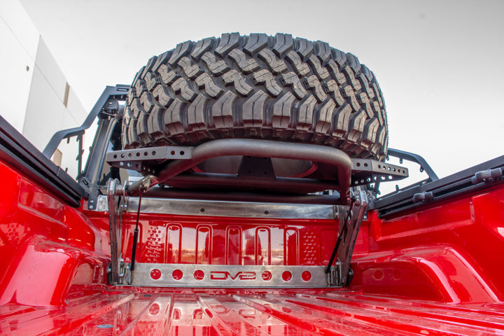 DV8 Offroad 2019+ Jeep Gladiator In-Bed Adjustable Tire Carrier - Bull Strap