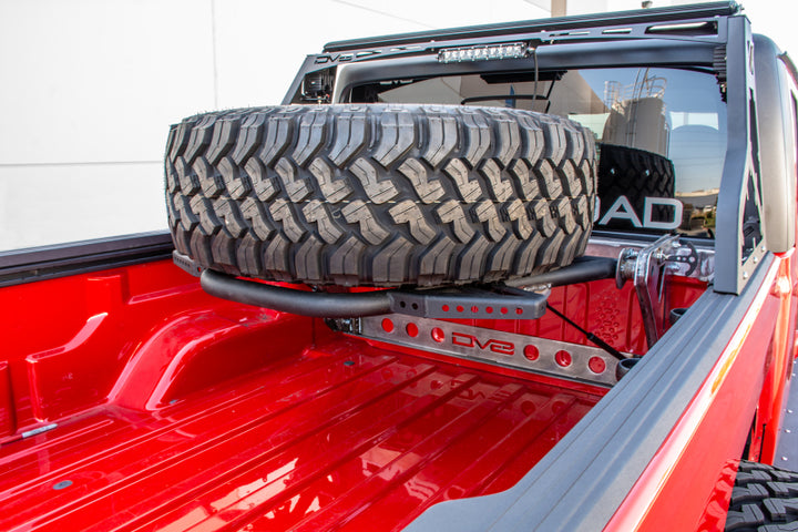 DV8 Offroad 2019+ Jeep Gladiator In-Bed Adjustable Tire Carrier - Bull Strap