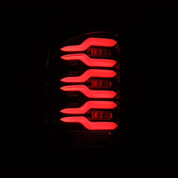 AlphaRex 14-18 Chevy Silverado 1500 Luxx-Series LED Tail Lights Alpha-Black w/Activ Light/Seq Signal - Bull Strap