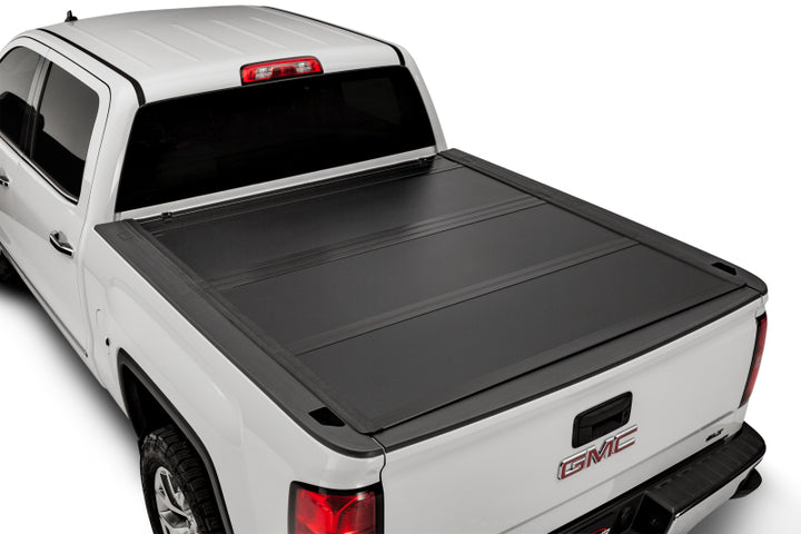 UnderCover 19-20 Chevy Silverado 1500 5.8ft Ultra Flex Bed Cover - Matte Black Finish - Bull Strap