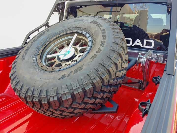 DV8 Offroad 2019+ Jeep Gladiator In-Bed Adjustable Tire Carrier - Bull Strap