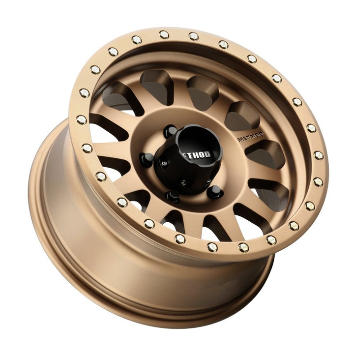 Method MR304 Double Standard 15x8 -24mm Offset 5x4.5 83mm CB Method Bronze Wheel - Bull Strap