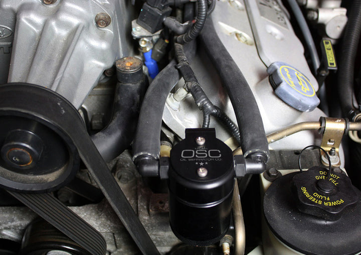 J&L 99-04 Ford Mustang SVT Cobra Driver Side Oil Separator 3.0 - Black Anodized - Bull Strap