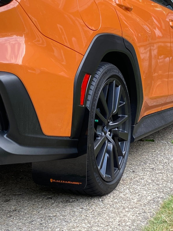 Rally Armor 22-25 Subaru WRX Black UR Mud Flap w/Orange Logo - Bull Strap